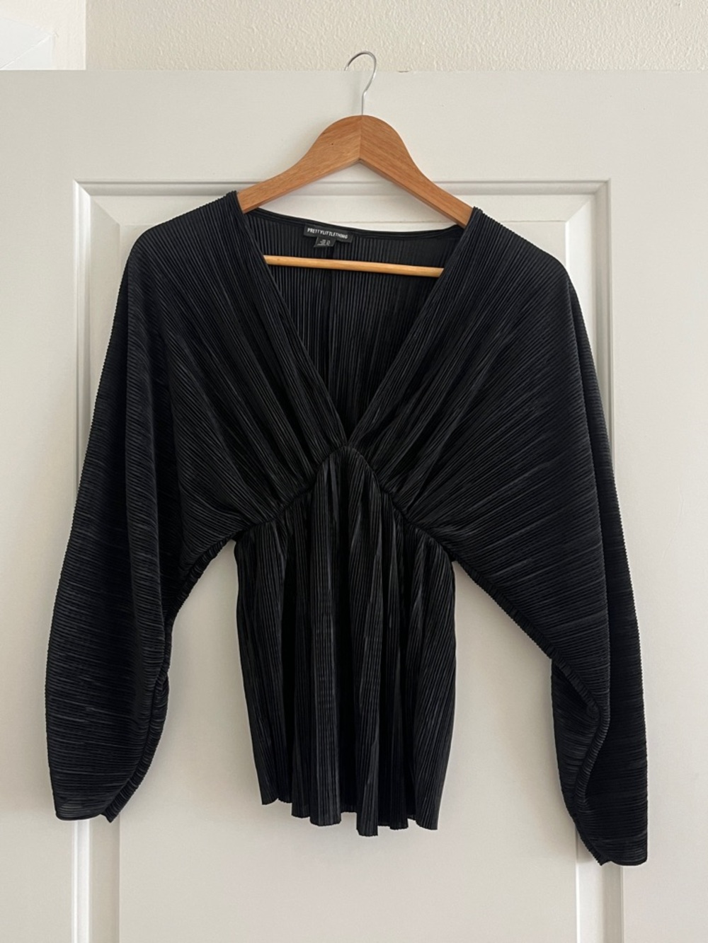 PrettyLittleThing Black Plisse Batwing Elegant Pleated V-Neck Draped Top